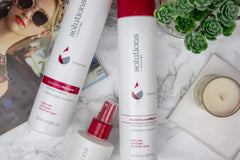 Great Clips Solutions Nourishing Shampoo argan oil close-up highlighting nourishing formula.