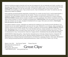 Applying GREAT CLIPS conditioner to strands for detangling and shine.