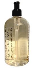 Greenwich Bay Orange Blossom Chai Tea Hand Soap at kitchen sink; removes odors and moisturizes skin.