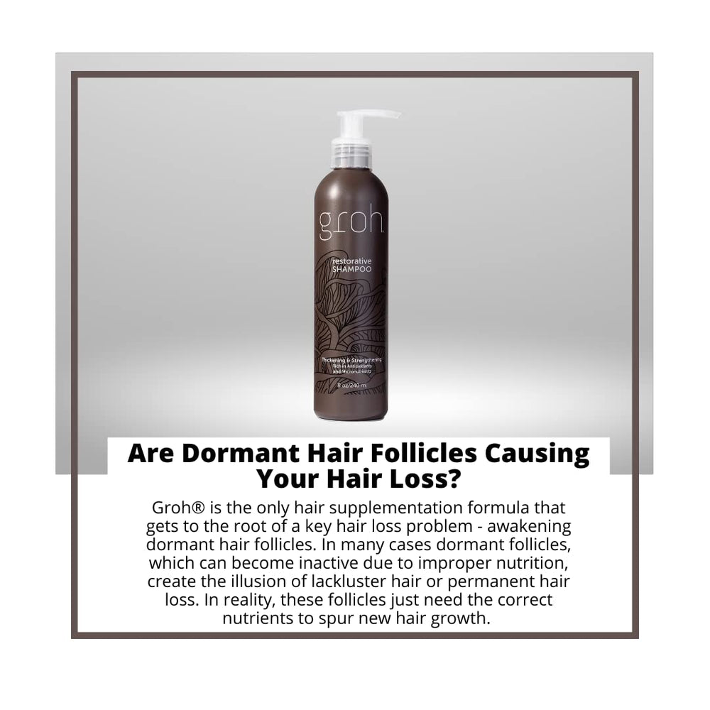 Rinsing water running through hair with GROH Restorative Shampoo.