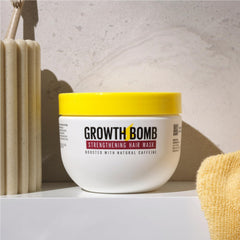 Creamy texture of GROWTH BOMB mask ready to nourish hair