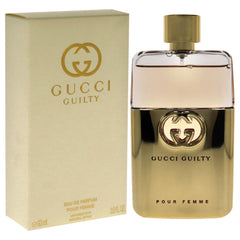 Gucci Guilty Pour Femme bottle close-up emphasizing patchouli and amber depth.