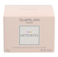 Guerlain Meteorites Perles under bright light highlighting luminous pearlescent particles