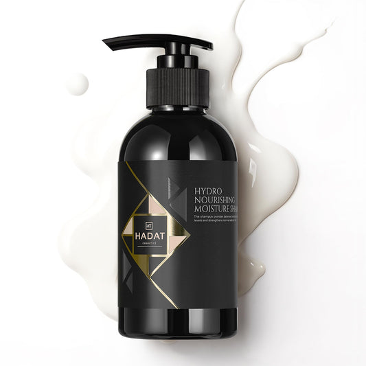 HADAT Hydro Nourishing Moisture Shampoo bottle close-up showing lightweight hydration for dry hair.