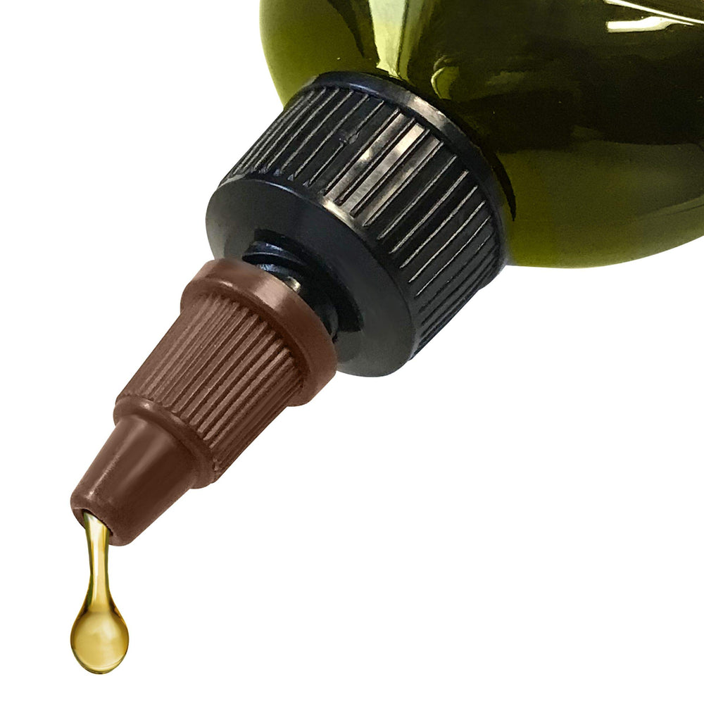 Hair Chemist oil texture on hand demonstrating lightweight absorption benefit