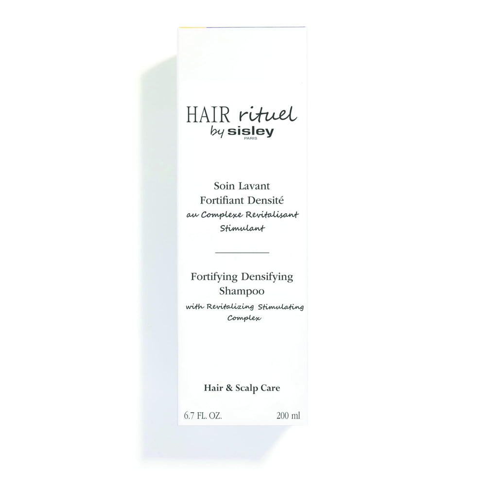 Hair Rituel by Sisley follow-up serum pairing shown for enhanced results.