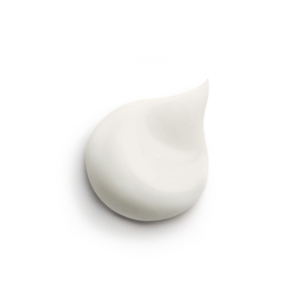 Hair Rituel by Sisley Intense Nutrition Mask cream texture close-up suggests rich nourishment.