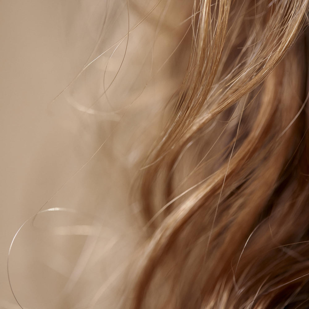 Hair Rituel by Sisley Intense Nutrition Mask close-up reveals radiant shine.