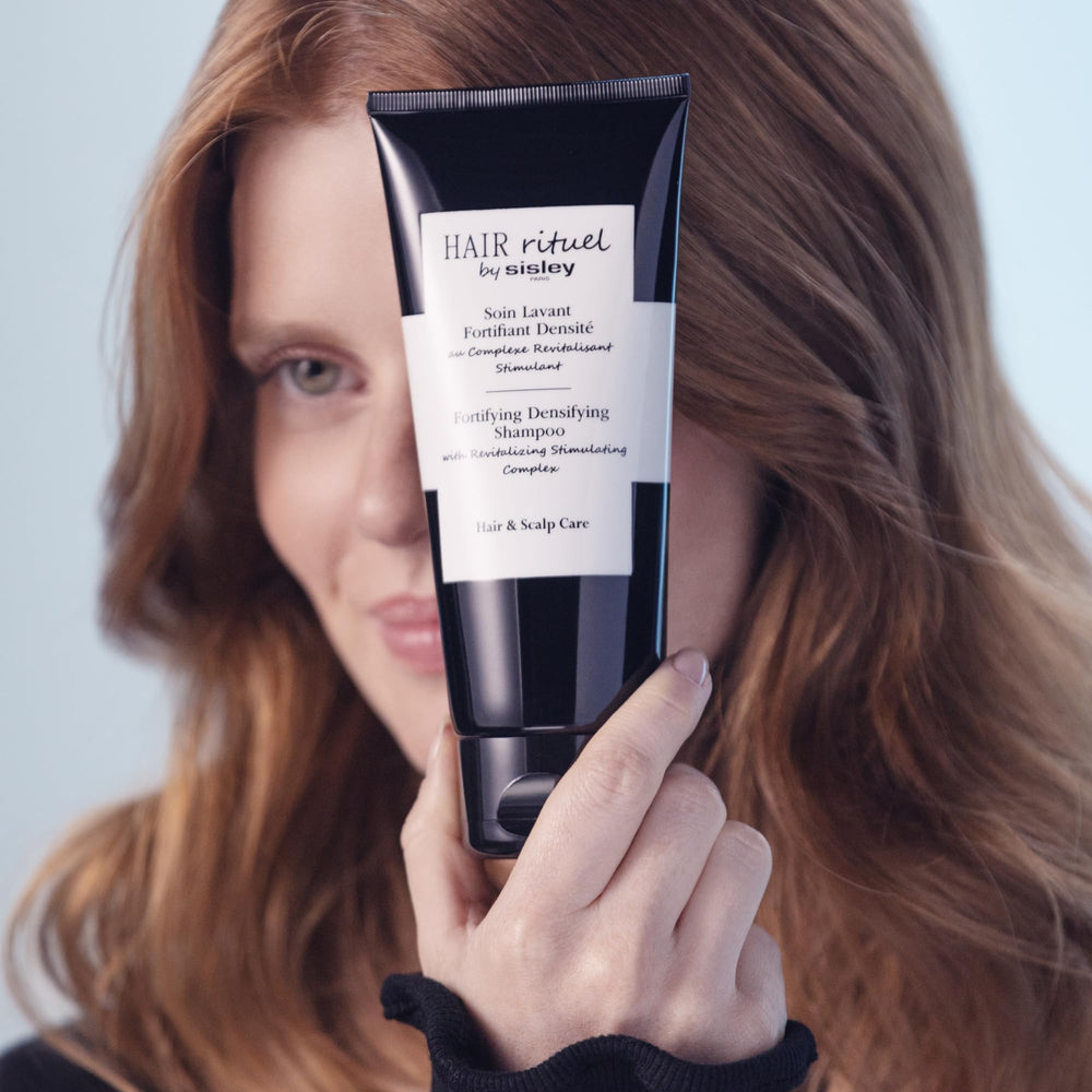 Hair Rituel by Sisley lather forming on scalp during application.