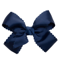 HAIRBOWS navy grosgrain scalloped-edge bow on clip adds a polished look.