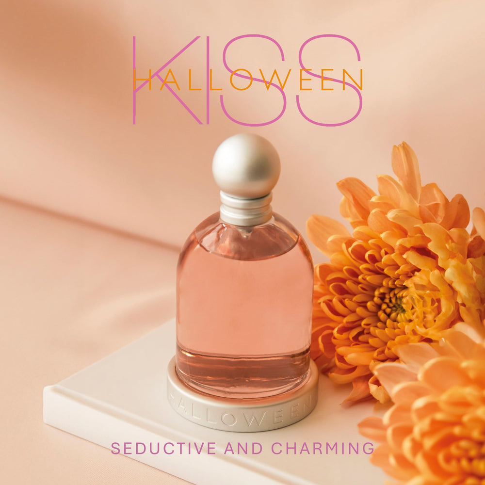 Halloween Kiss bottle close-up label highlights watermelon and orchid notes for a fresh feel.