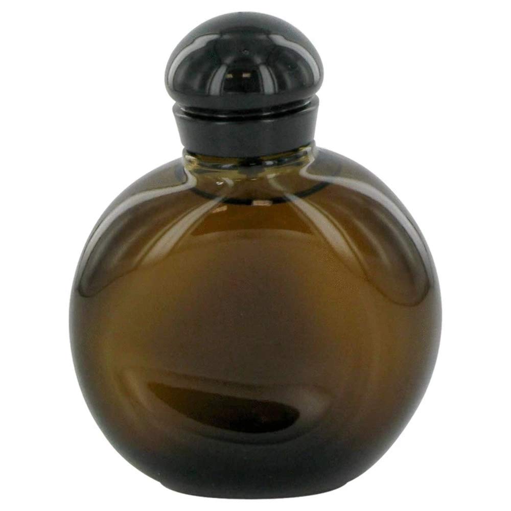 HALSTON Z-14 bottle highlights cedar and amber notes for a refined, confident everyday fragrance.