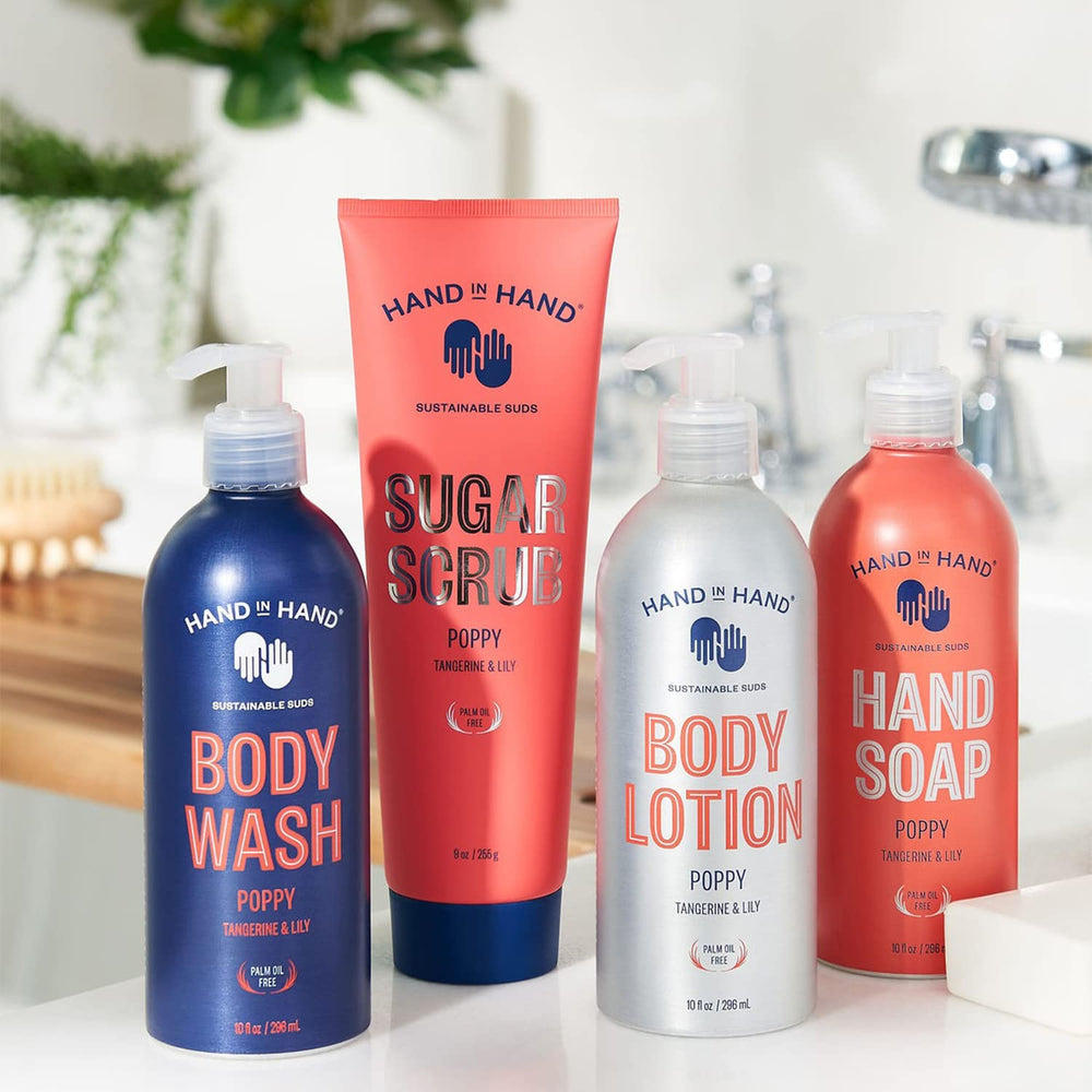 Hand in Hand Body Wash bottle in action delivering a rich, refreshing cleanse.