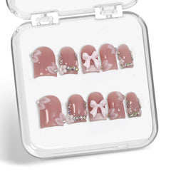 10 Pcs Handmade Press On Nails with 3D bow and rhinestones for a chic pink look.