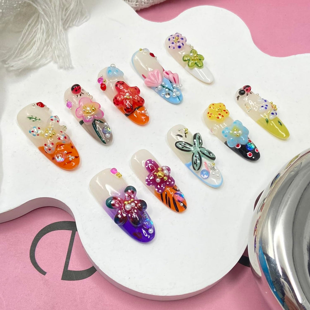 Handmade press-on nails showcasing glossy rhinestones detail for chic sparkle.