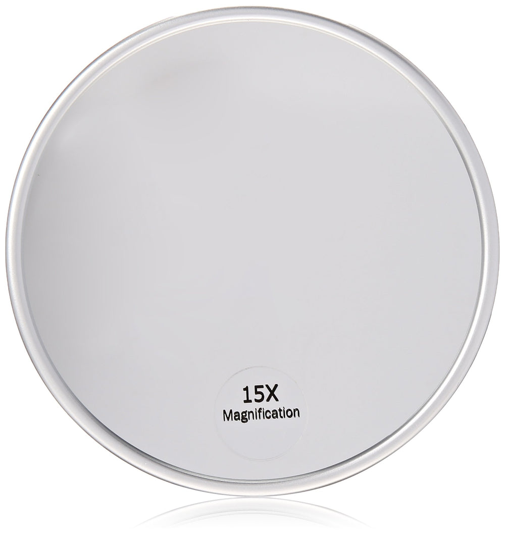 Harry D Koenig & Co 15x magnification mirror with suction back for wall mounting.