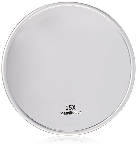 Harry D Koenig & Co 15x magnification mirror with suction back for wall mounting.
