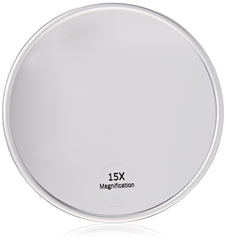 Harry D Koenig & Co 15x magnification mirror with suction back for wall mounting.