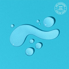 HASK Argan Repairing Hair Oil applying to wet hair for smooth finish