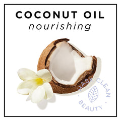 Applying HASK Coconut Nourishing Deep Conditioner to wet hair for hydration
