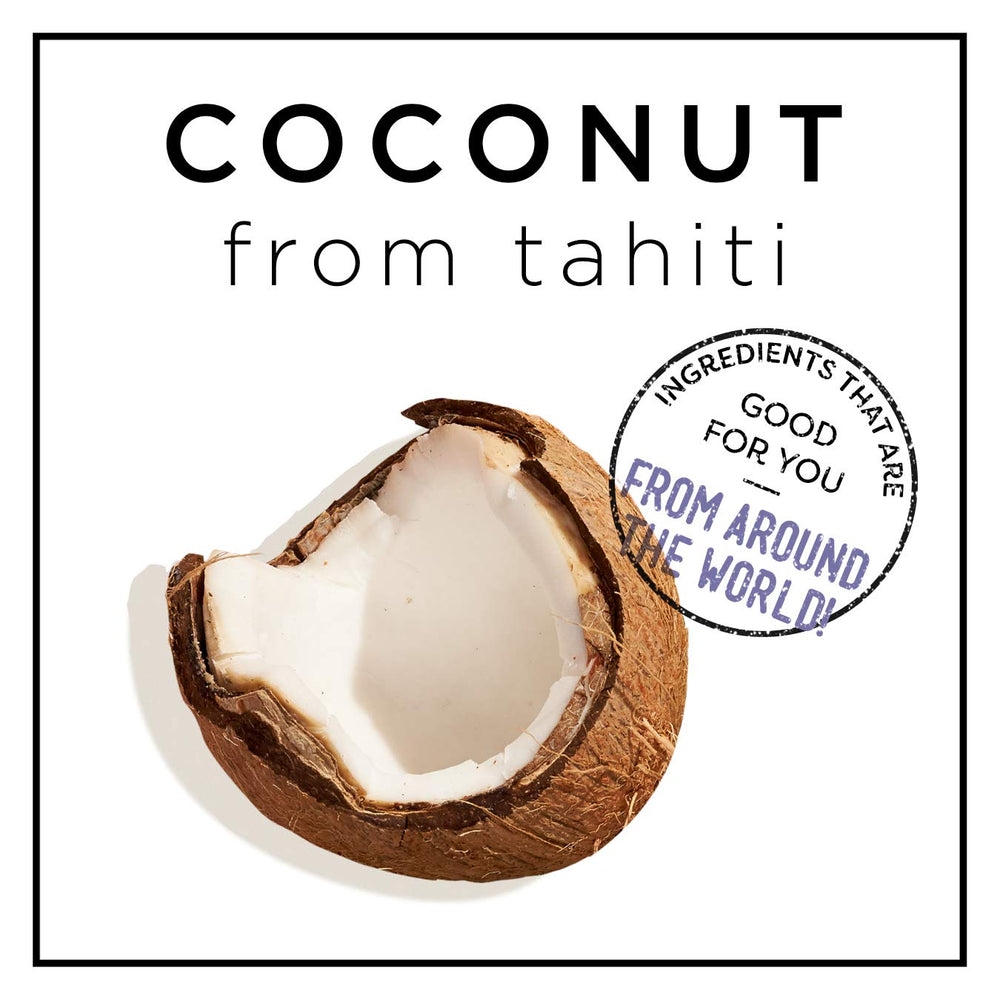 Applying HASK Coconut Oil Nourishing Deep Conditioner to damp hair.
