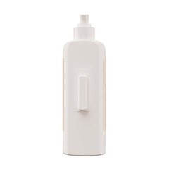 Hawaiian Tropic shampoo on wall offers quick guest access.