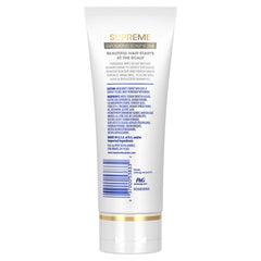 Head & Shoulders Supreme exfoliating scrub being massaged onto the scalp before shampoo.