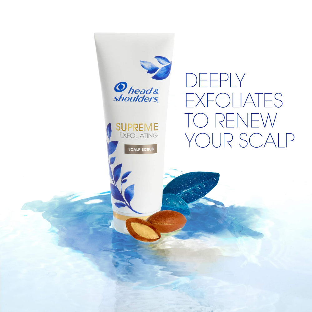 Head & Shoulders Supreme exfoliating scrub shows argan oil droplets in the creamy formula.