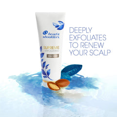 Head & Shoulders Supreme exfoliating scrub shows argan oil droplets in the creamy formula.