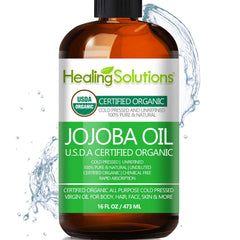 Healing Solutions Jojoba Oil bottle pouring for daily hair and skin hydration.