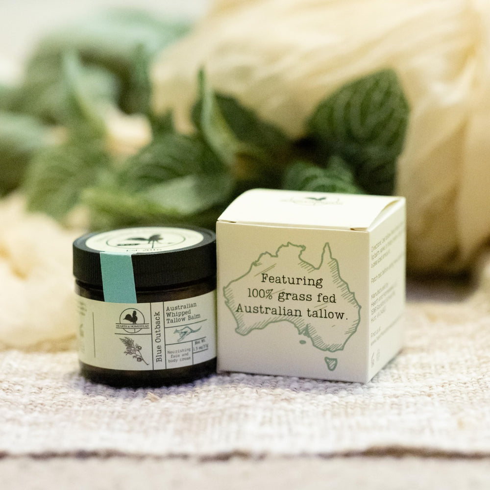 Hearth and Homestead Blue Outback Balm packaging label highlights natural origins.