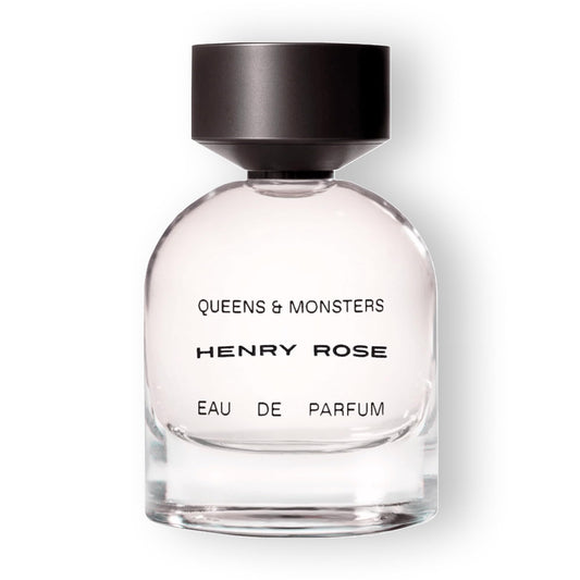 Henry Rose Queens Monsters bottle front with amber glow for daily unisex wear.