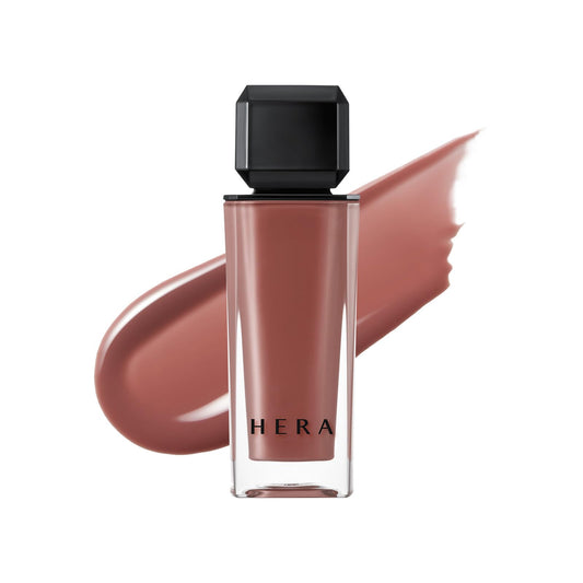 HERA Sensual Nude Gloss bottle close-up showing luxurious shine and translucent color