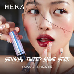 HERA lip swatch reveals sheer-to-buildable color with luminous shine.
