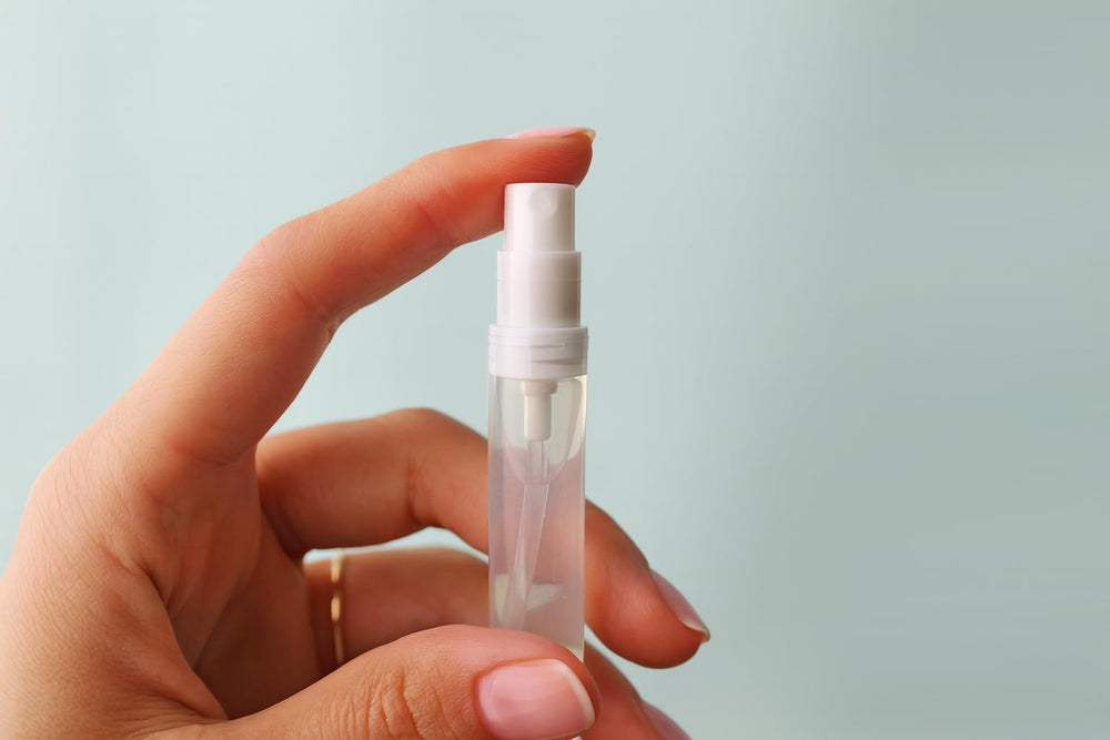 Attar of Roses vial featuring rose and sandalwood for elegant daytime wear.