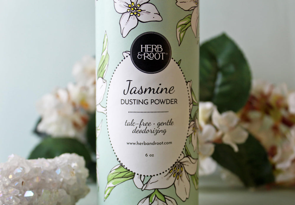 Herb & Root Jasmine talc-free body powder bottle for long-lasting freshness and gentle care.