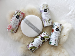 Herb & Root talc-free packaging close-up shows clean design.