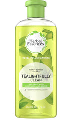 Herbal Essences Tea-Lightfully Clean Shampoo bottle with refreshing tea tree scent for daily cleansing.