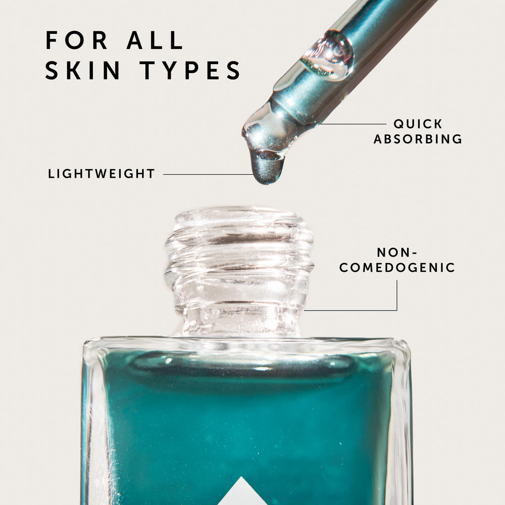 HERBIVORE Lapis Facial Oil on hand shows light texture for daily use