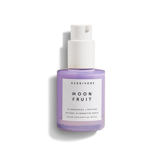 HERBIVORE Moon Fruit Serum bottle pour highlights a lightweight plant-based formula for smoother skin