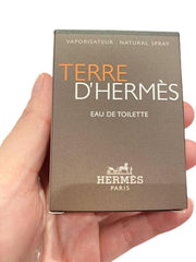 Hermès Terre d’Hermès packaging; convenient travel size for on-the-go appeal.