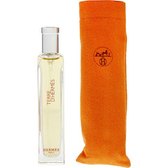 Hermès Terre D’Hermès for Men parfum label close-up emphasizes citrus, mineral and wood notes for versatile wear