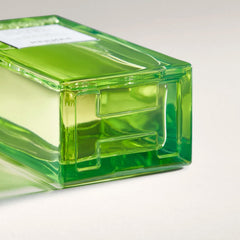Hermès Un Jardin Sur Le Toit pump detail highlighting refillable luxury.