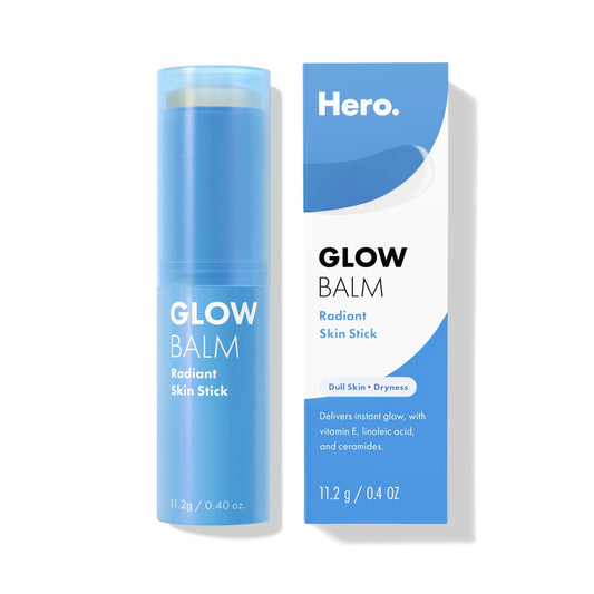 Hero Cosmetics Glow Balm applied to cheek for a dewy glow