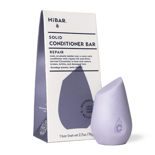 HiBAR Repair Conditioner Bar applied to wet hair for nourishment and detangling