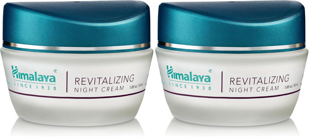 Himalaya Revitalizing Night Cream bottle glows softly, offering overnight hydration for refreshed morning skin.