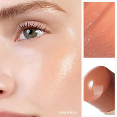 HINCE True Dimension Radiance Balm applied to cheek for natural glow.