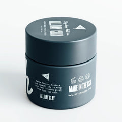 Hitch All Day Clay application on hair demonstrates easy emulsifying motion.