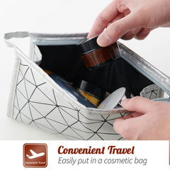 Compact 1oz jar by 11 Hoa Kinh fits cosmetic bag.