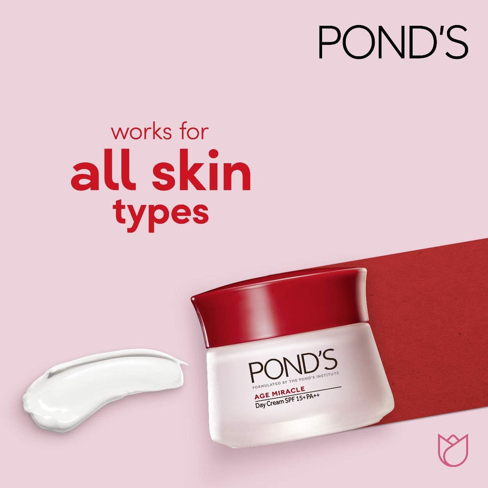 Holly Herbs Ponds Age Miracle Day Cream tube close-up showing SPF 15 protection.